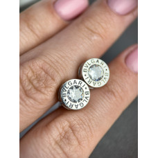 Срібні сережки в стилі Bvlgari закрутки з одним каменем посередині